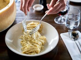 Plate of spaghetti on restaurant table